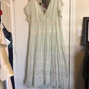 Light green swing dress with crochet accent